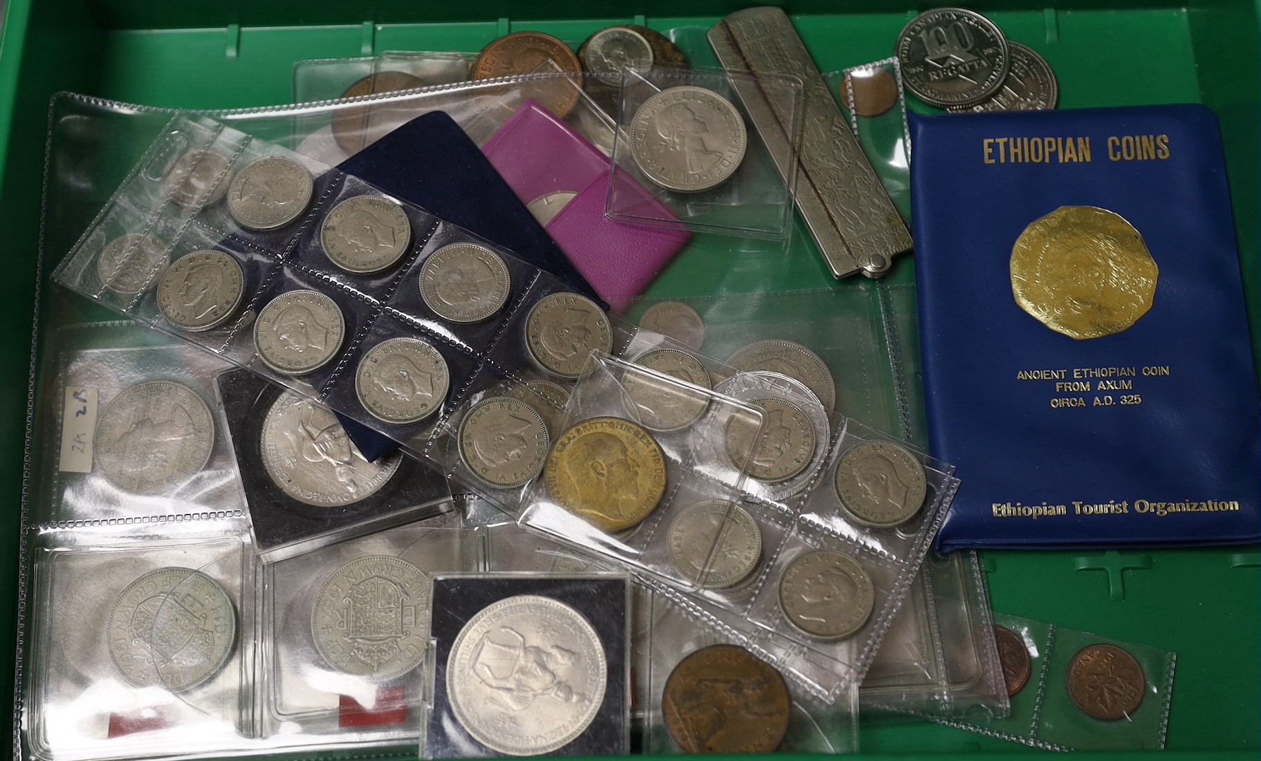 A collection of UK coins and bank notes